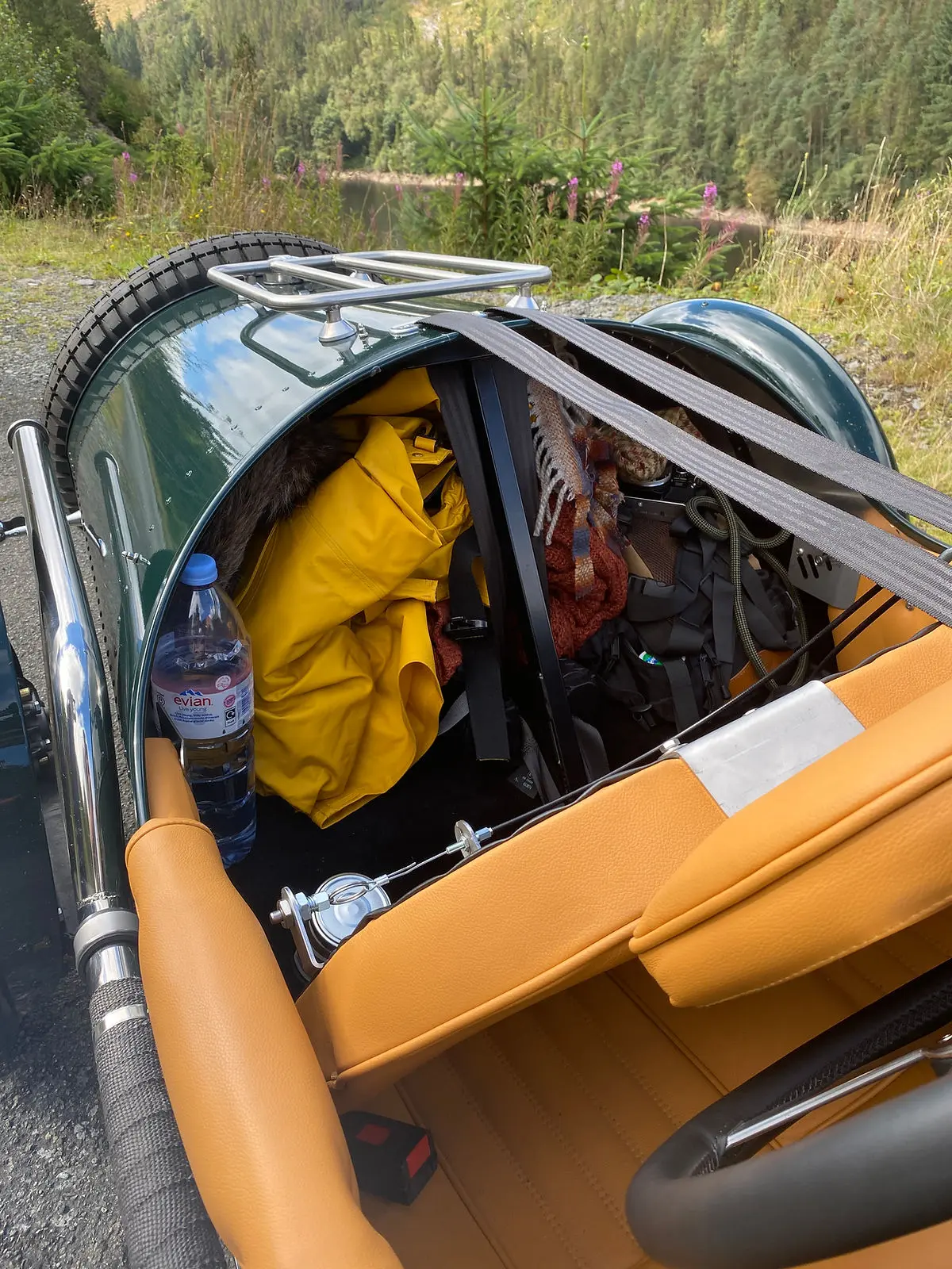 A pembleton roadster with luggage in the boot