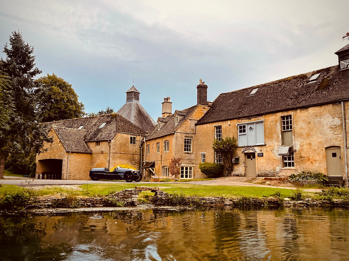 Cotwsold road trip in an open top sports car to visit brewery