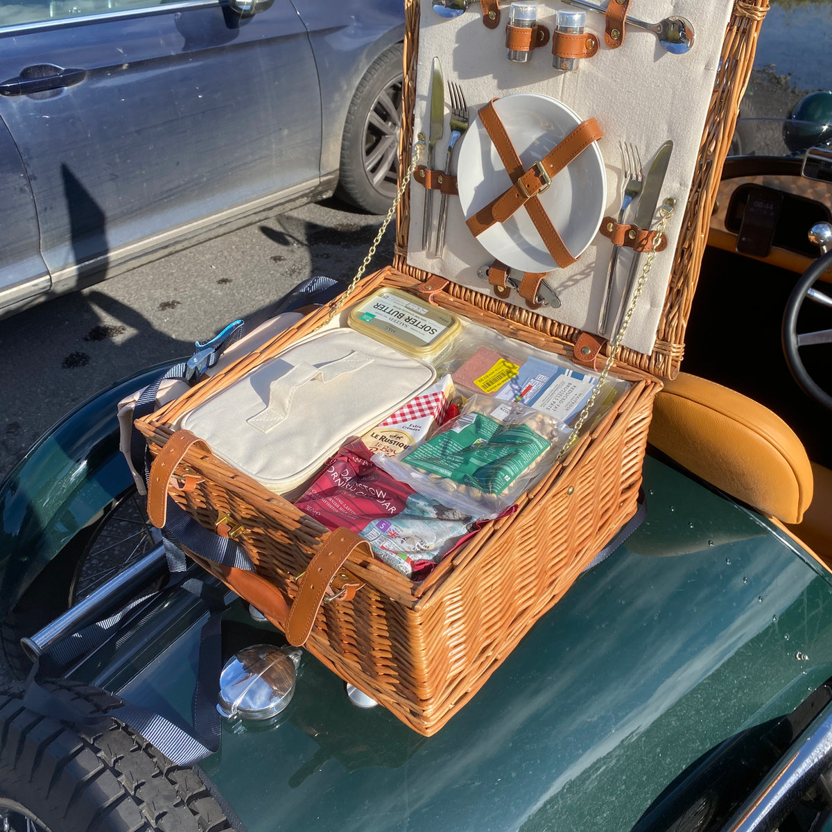 A pembleton roadster with luggage rack for a picnic