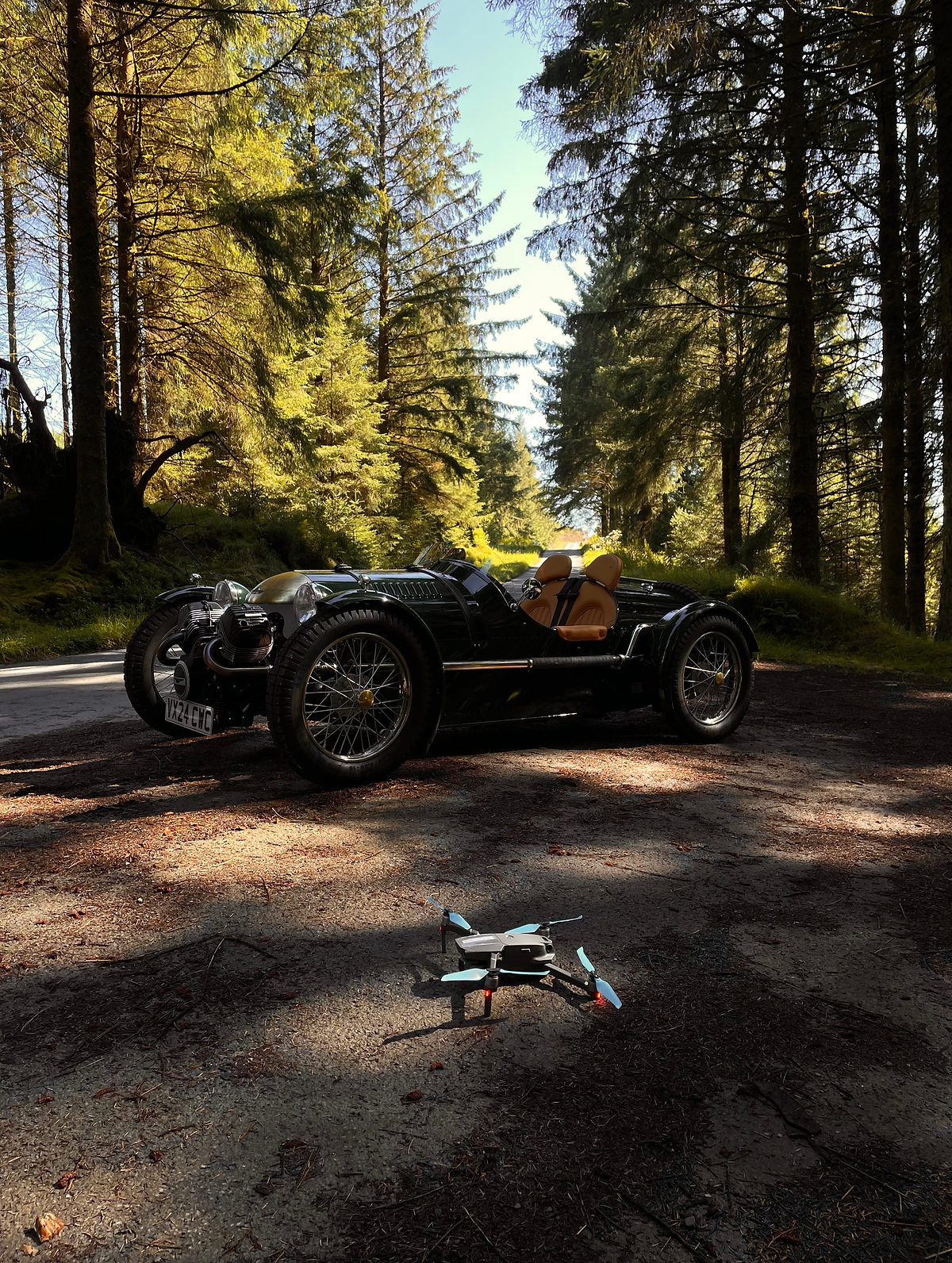 A dji mavic pro drone shooting the pembleton t24 roadster on a road trip